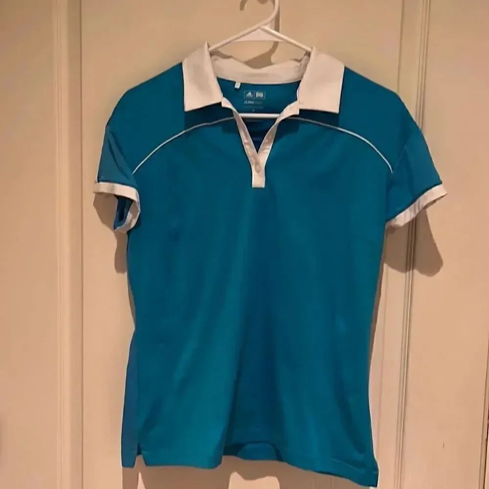Adidas. With local golf club on sleeve. Barely worn. Size M